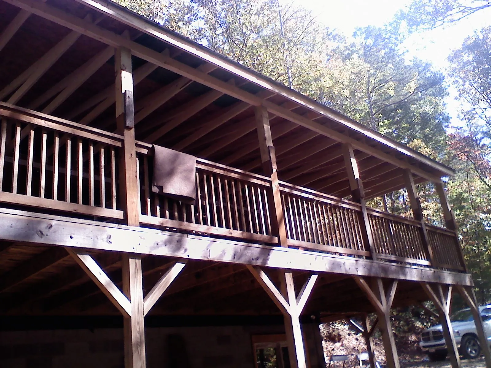 Timber framing under a new elevated porch and deck — Roof Leak Repair in Pledger by Roofing Brothers